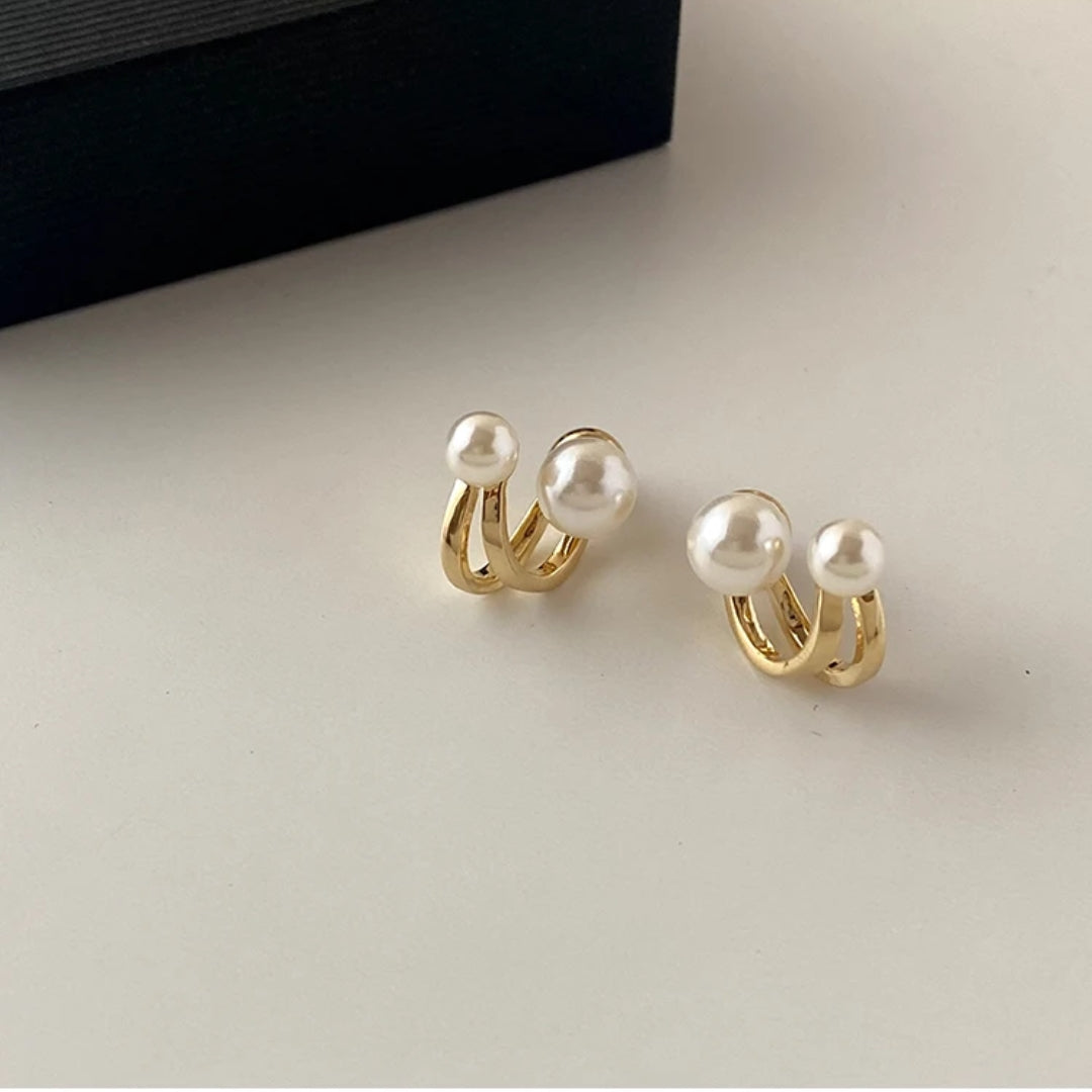Boucles d'oreilles en perles dorées en spirale