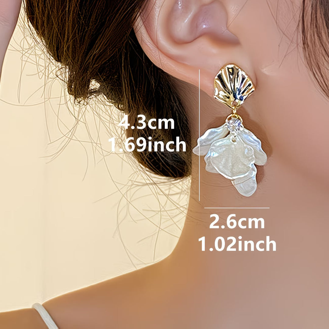 Les Boucles d'Oreilles en Perles de Pétales Givrées