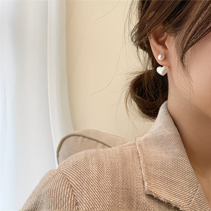 Boucles d'oreilles en forme de cœur avec double perle