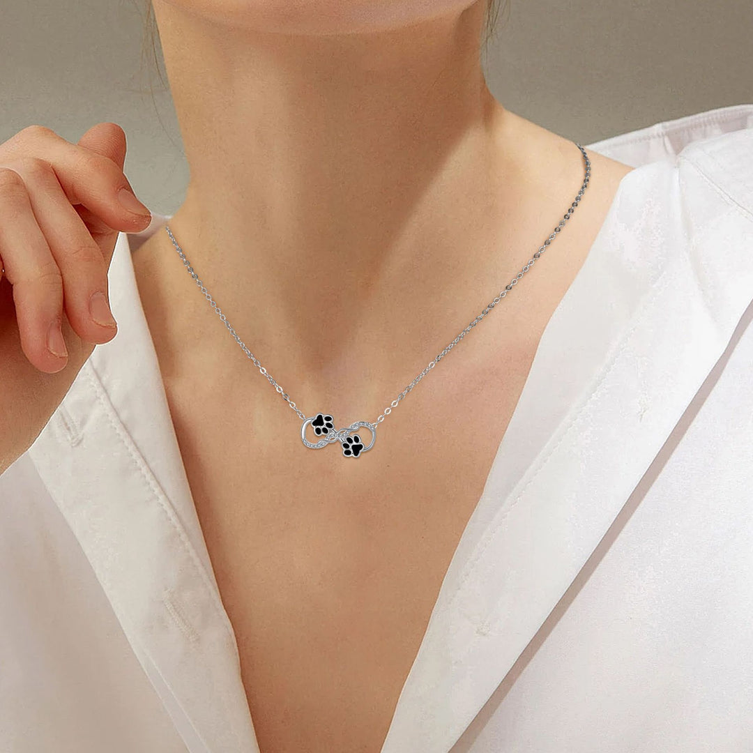 Pendentif en forme de symbole de l'infini avec zirconia