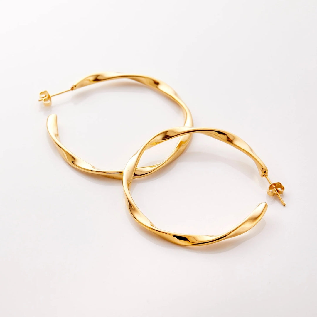 Boucles d'oreilles créoles en or tressé