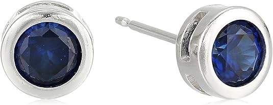 Boucles d'oreilles à clou avec sertissage en saphir | Or blanc