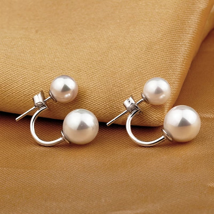 Boucles d'oreilles à déclaration en double perle
