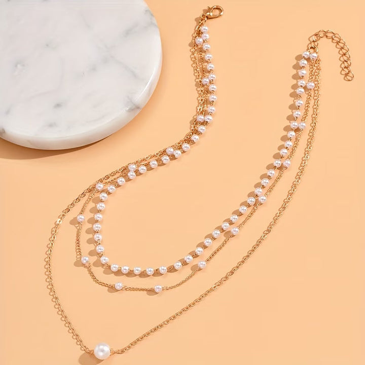 Le collier couche perle Trinity
