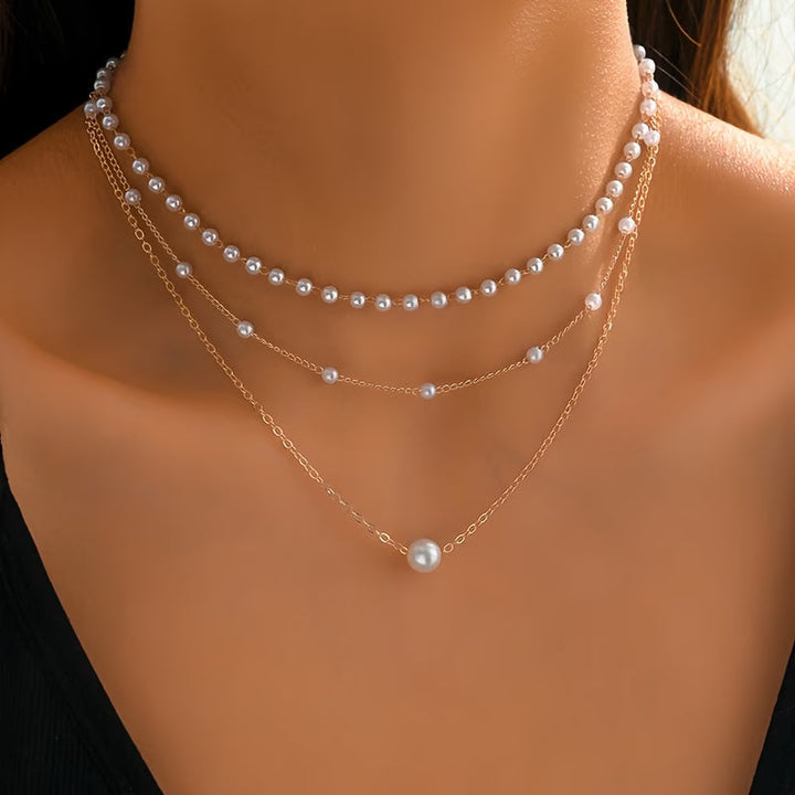 Le collier superposé en perles Trinity