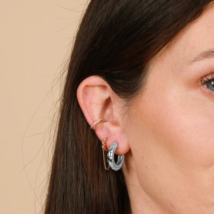 Boucles d'oreilles cosmiques en or blanc 16k