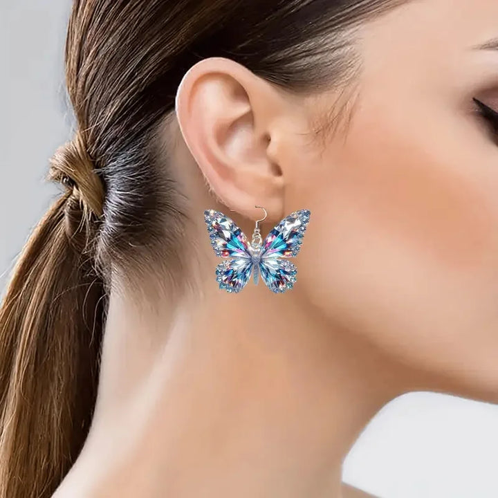 Boucles d'oreilles affirmées en forme de papillon scintillant