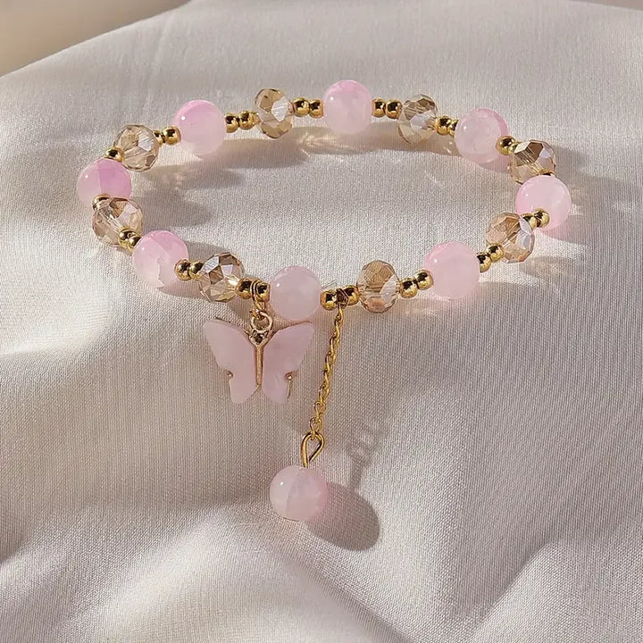 Magnifique bracelet en perles extensible en forme de papillon