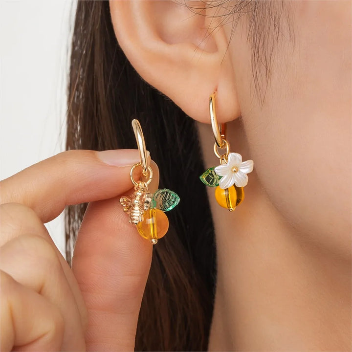 Boucles d'oreilles en forme de cerceau avec fleurs d'oranger