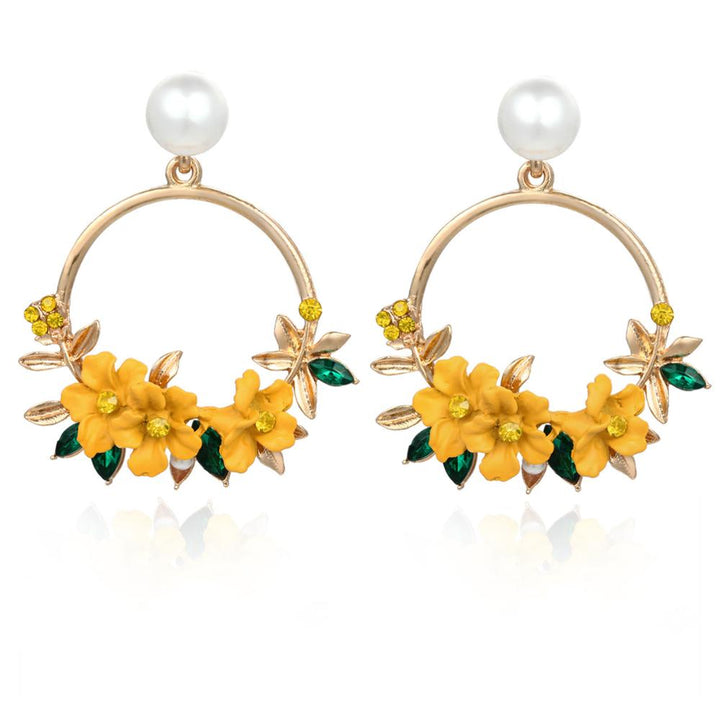 Boucles d'oreilles en or avec fleurs et perles