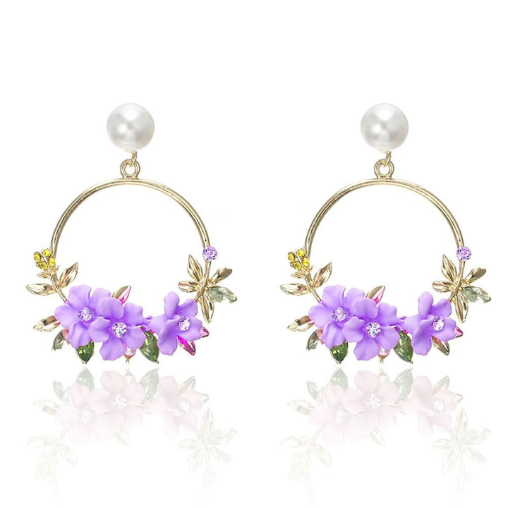 Boucles d'oreilles en fleur et perles en or