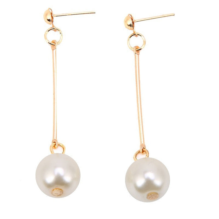 Boucles d'oreilles pendantes de luxe avec des perles plaquées à la main spéciales