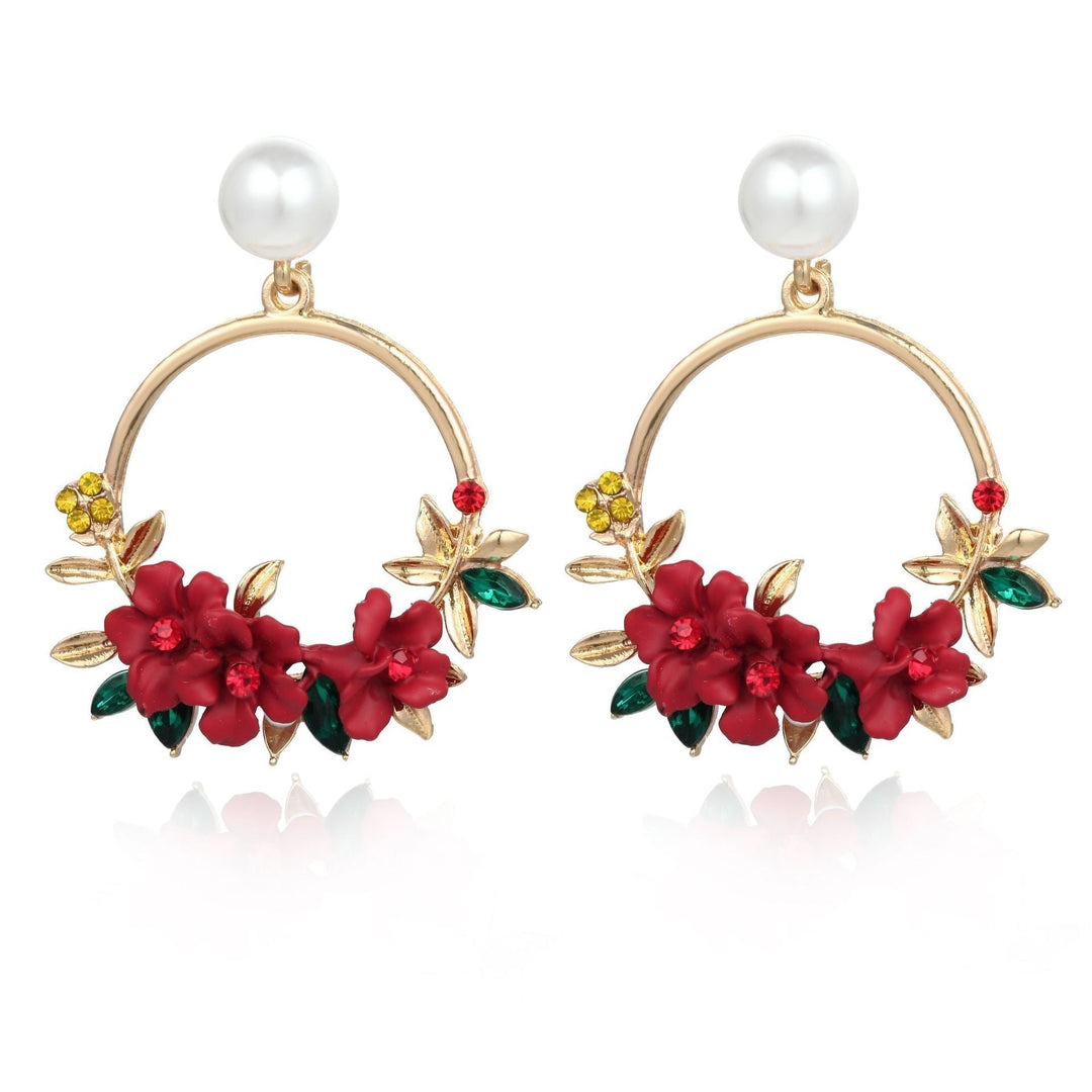Boucles d'oreilles en fleur et perles en or