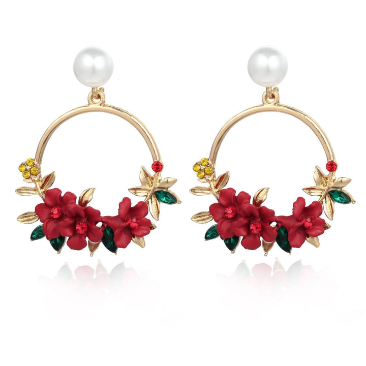 Boucles d'oreilles en fleur et perles en or