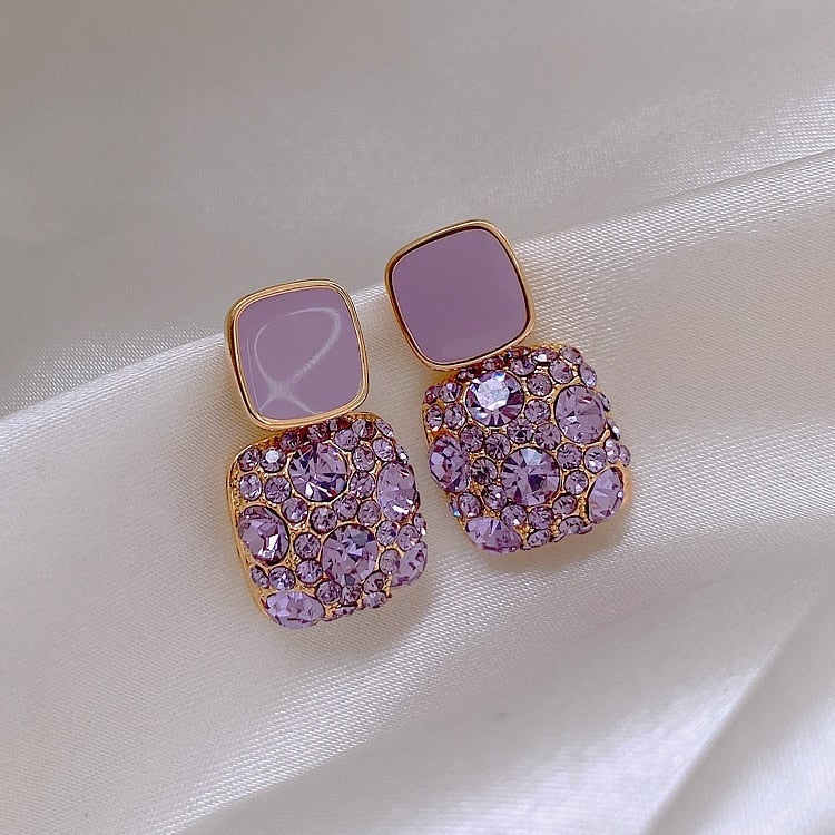 Boucles d'oreilles de luxe violettes avec incrustation de zirconia