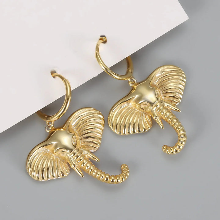 Boucles d'oreilles créoles avec charme éléphant