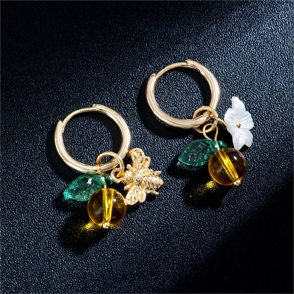 Boucles d'oreilles en forme de cerceau avec fleurs d'oranger