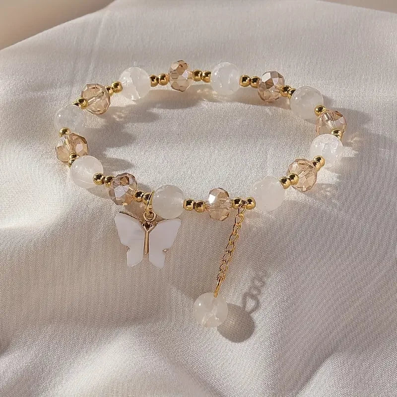 Bracelet extensible en perles avec beau papillon
