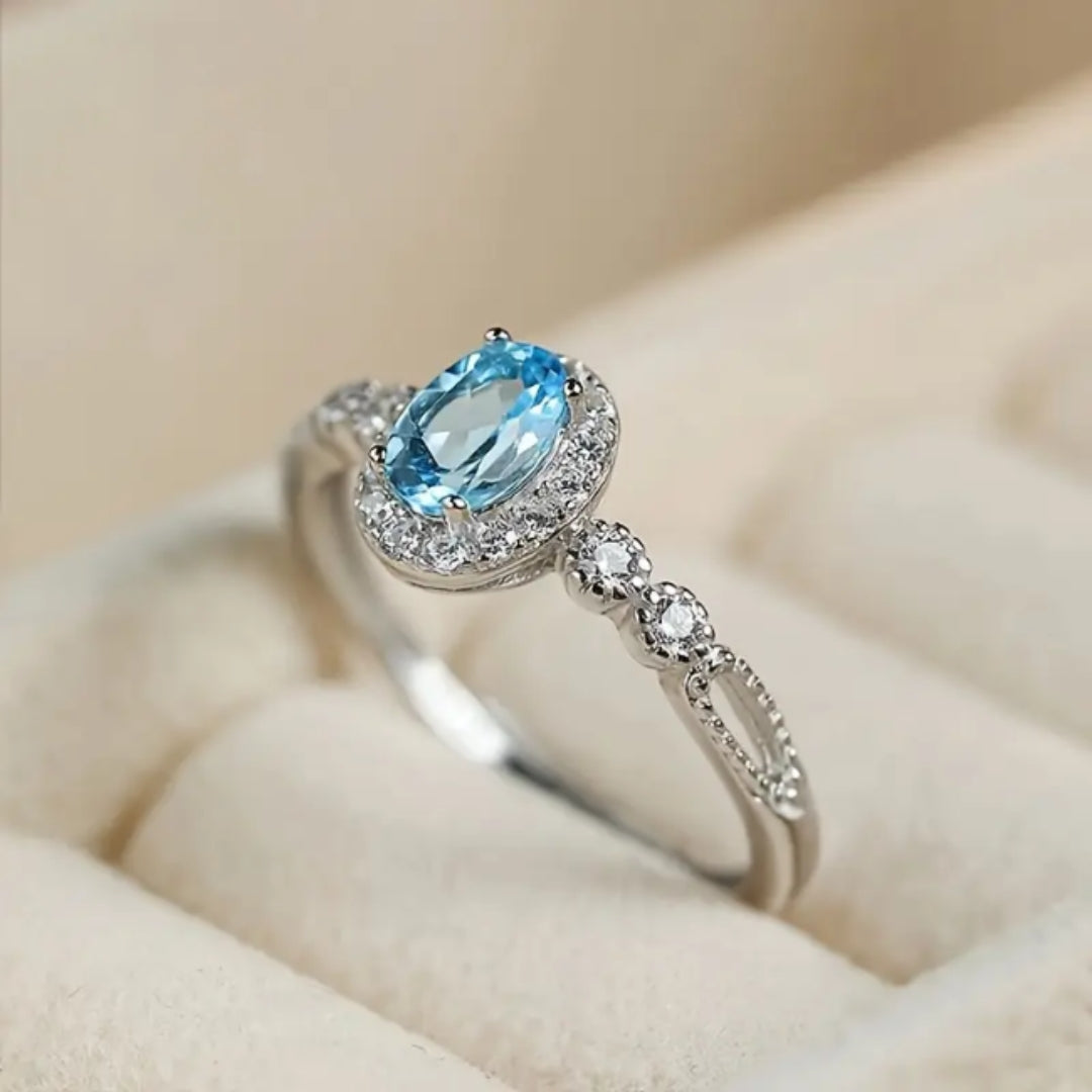 Bague en argent avec zirconium inlay bleu arrondi