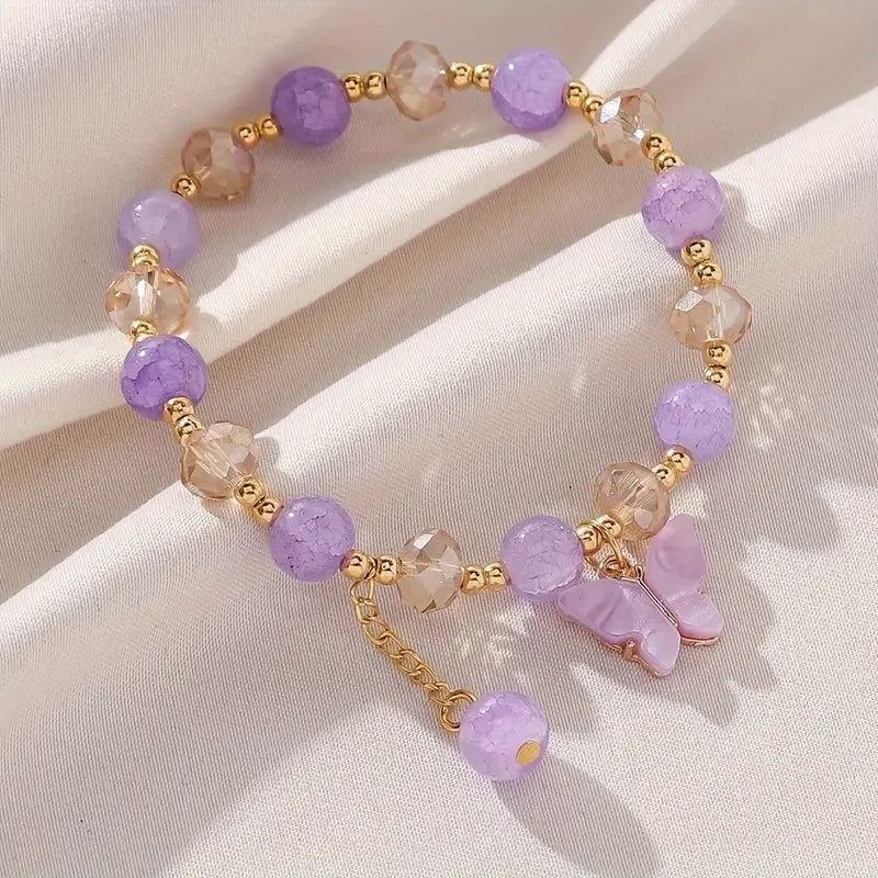 Magnifique bracelet en perles extensible en forme de papillon