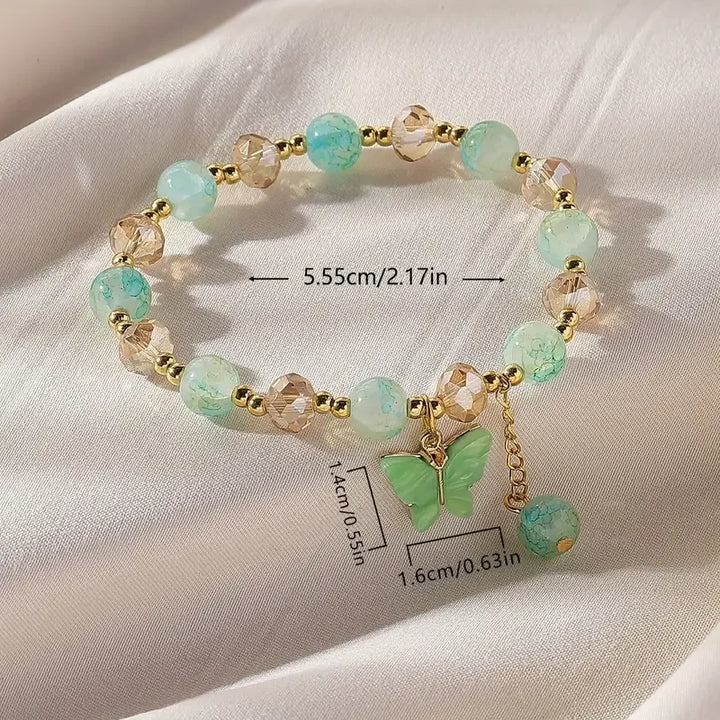 Bracelet extensible en perles avec beau papillon