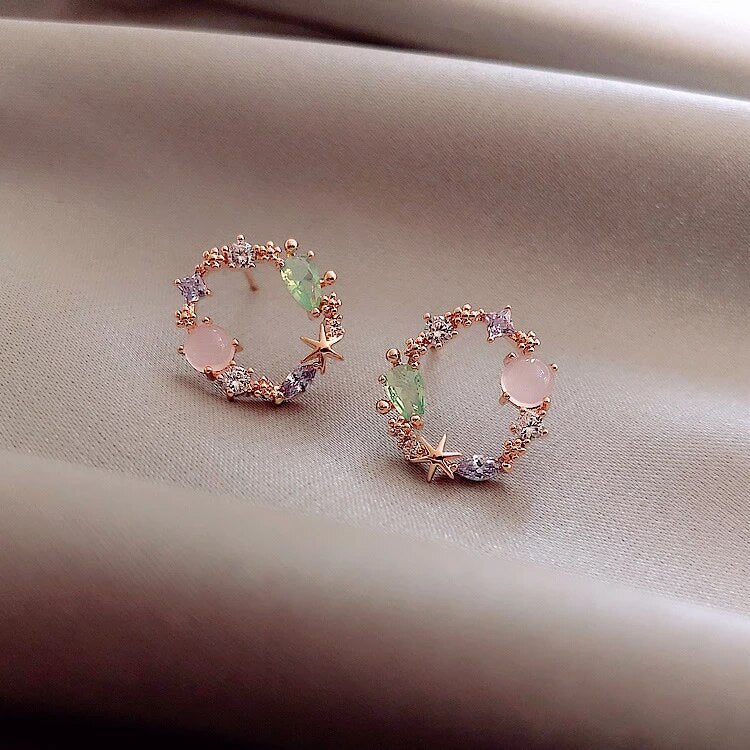 Boucles d'oreilles florales en or rose