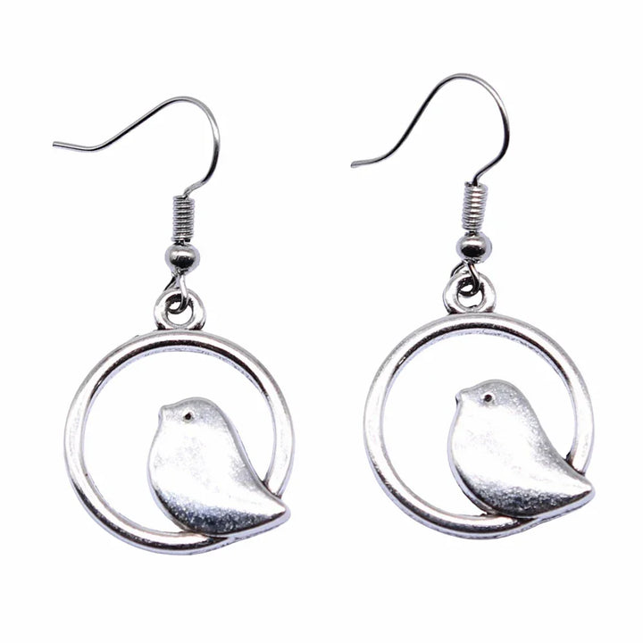 Boucles d'oreilles pendantes avec charme d'oiseau vintage – Bijoux boho faits main