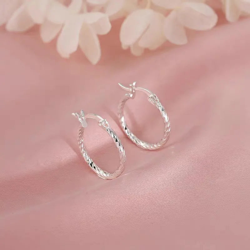 Boucles d'oreilles en argent à anneau torsadé