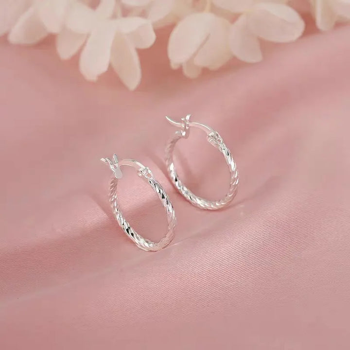 Boucles d'oreilles en argent à anneau torsadé