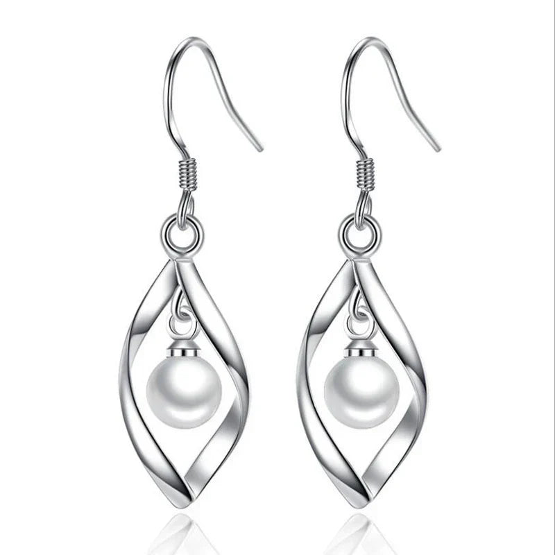 Boucles d'oreilles pendantes en forme de créole en perles
