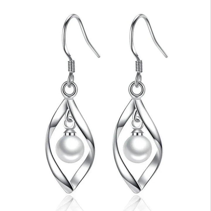 Boucles d'oreilles pendantes en forme de créole en perles