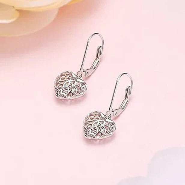 Boucles d'oreilles en forme de cœur creux argenté