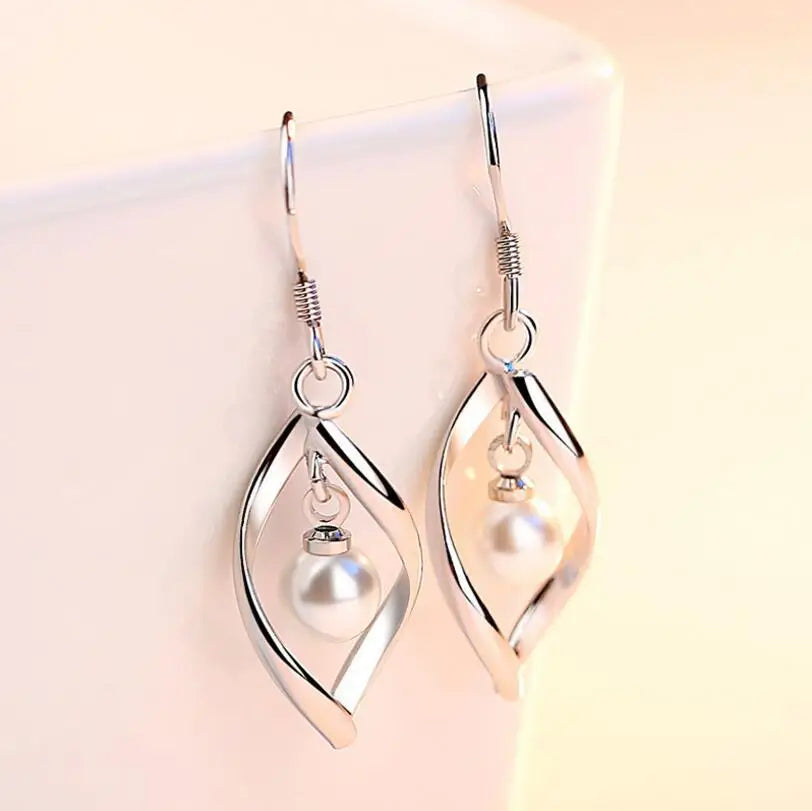 Boucles d'oreilles pendantes en forme de créole en perles