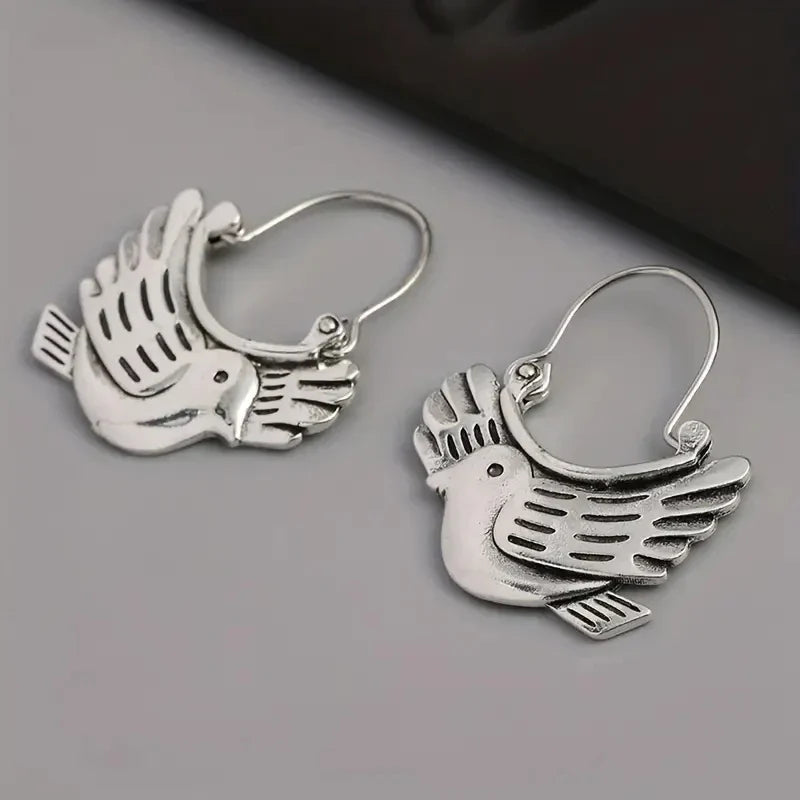 Boucles d'oreilles pendantes inspirées des oiseaux bohèmes – Argenté