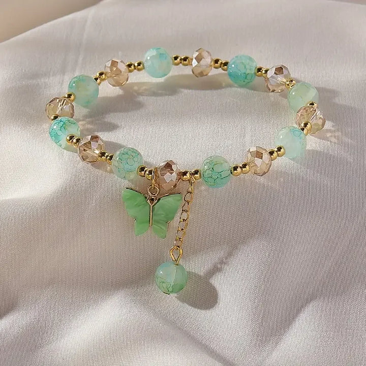 Magnifique bracelet en perles extensible en forme de papillon