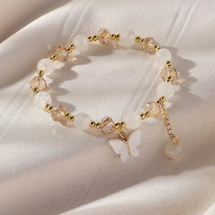 Magnifique bracelet en perles extensible en forme de papillon