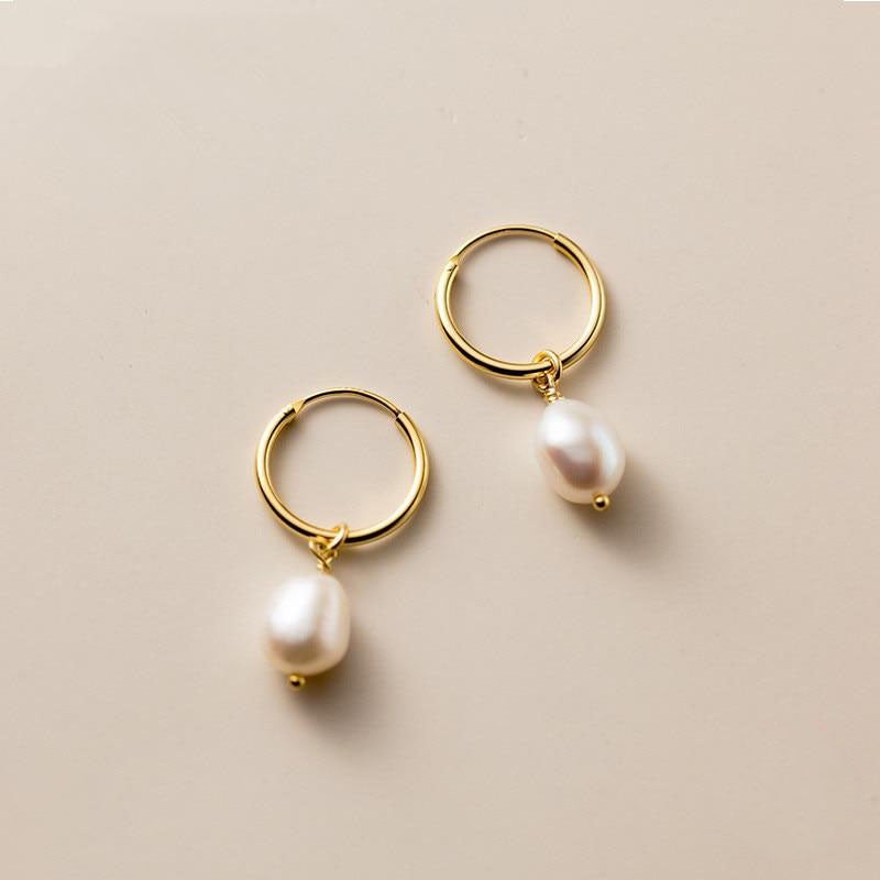 Boucles d'oreilles créoles en perles essentielles