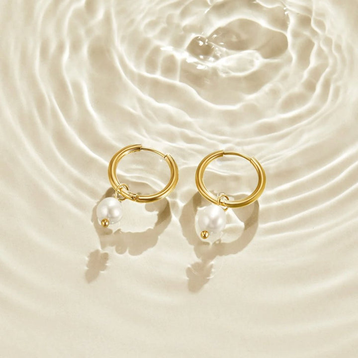 Boucles d'oreilles créoles en perles essentielles