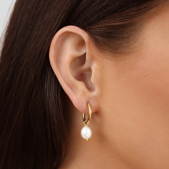 Boucles d'oreilles créoles en perles essentielles