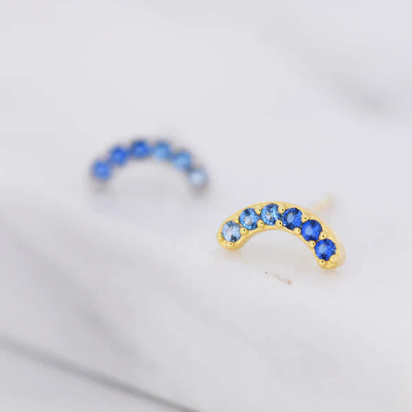 Boucles d'oreilles en arc en saphir bleu