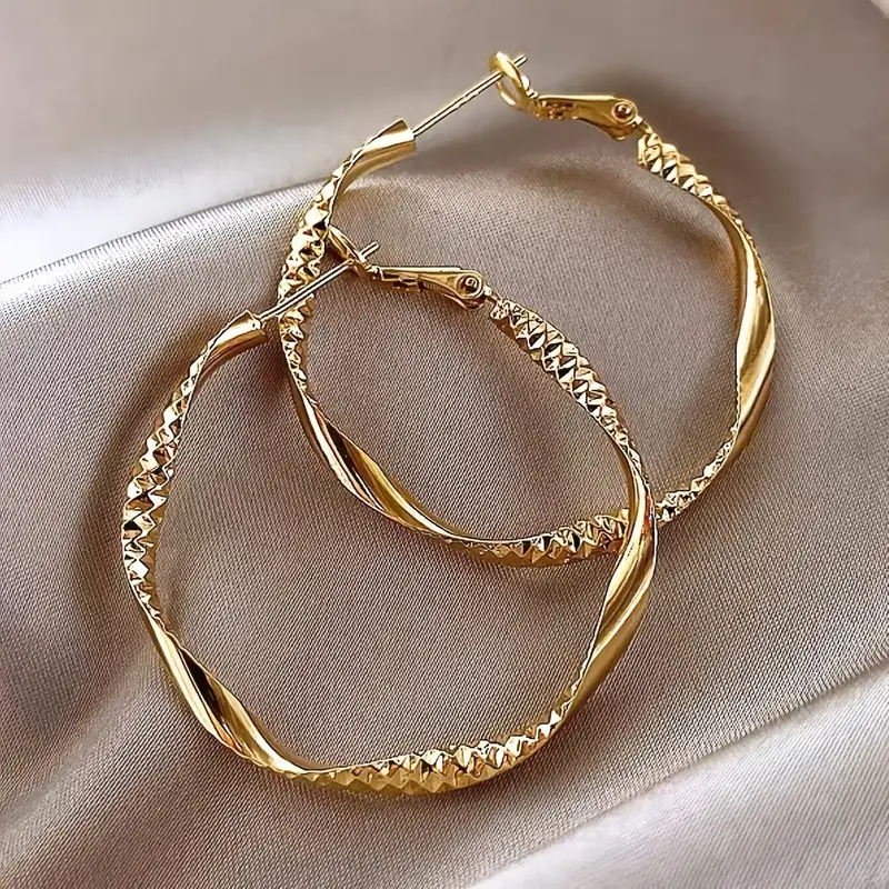 Boucles d'oreilles en or avec anneau lumineux