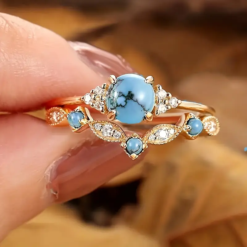 Bague en Opale Bleue et Zirconia Doré