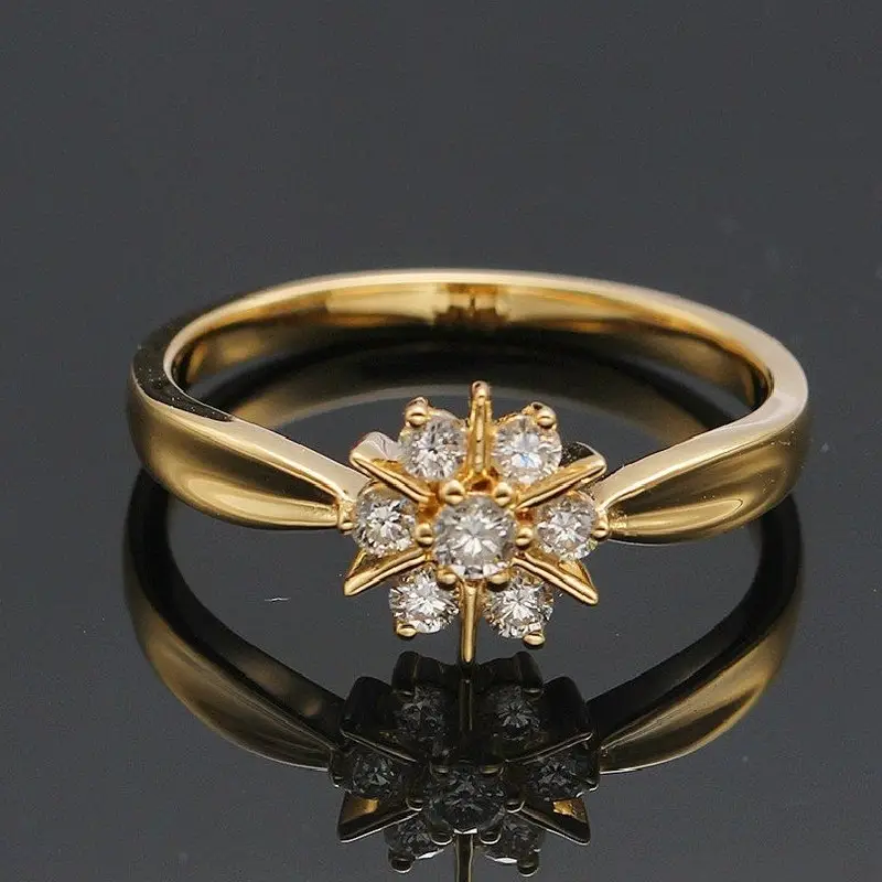 Bague en or avec zirconia en forme de marguerite