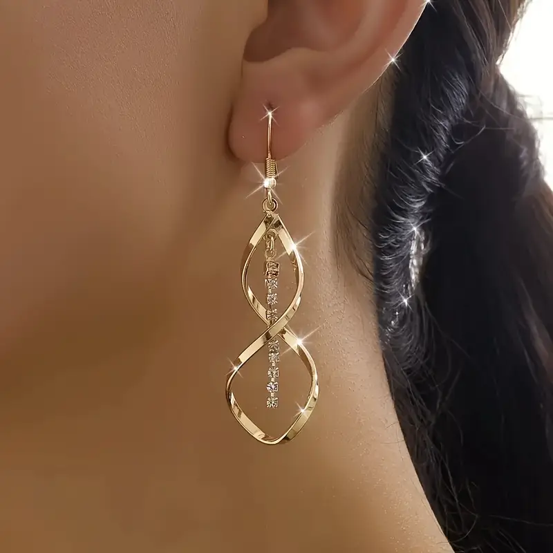 Boucles d'oreilles en spirale pendantes en or