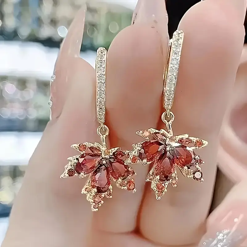 Boucles d'oreilles en or zirconium en forme de feuille