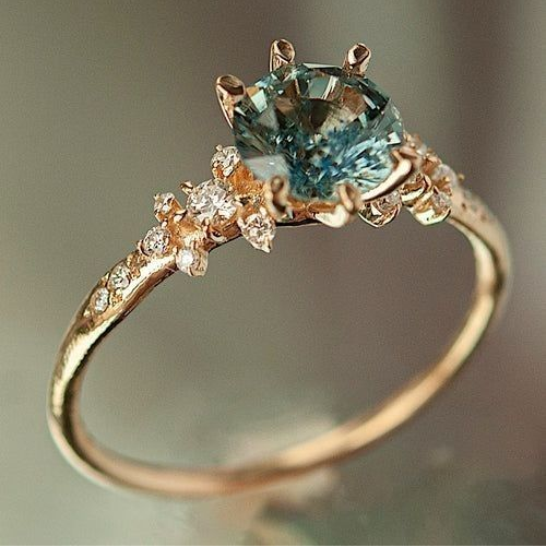 Bague dorée cristalline verte