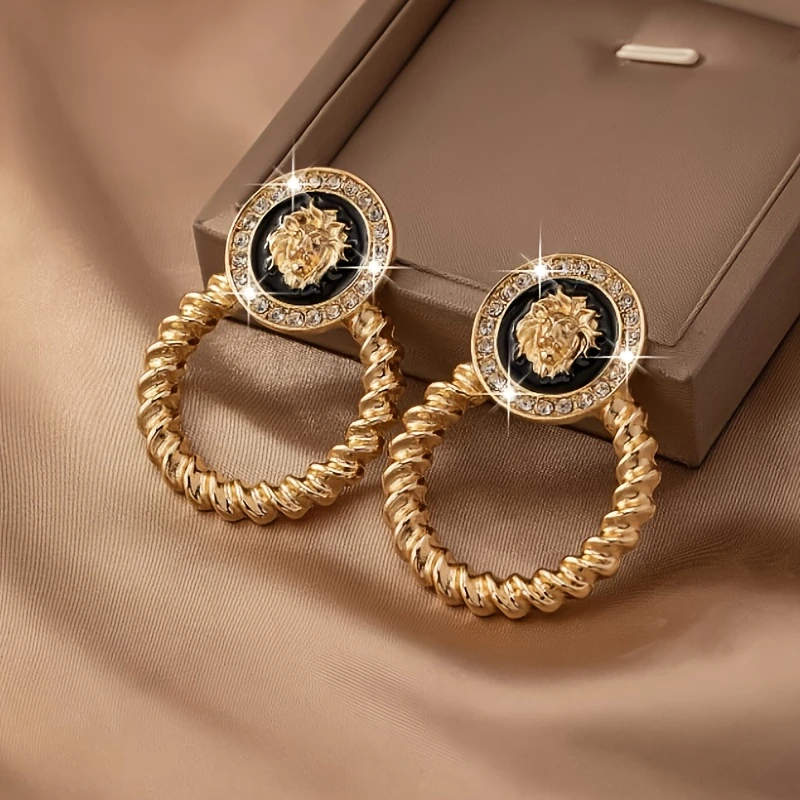 Boucles d'oreilles créoles en or brillant tressées