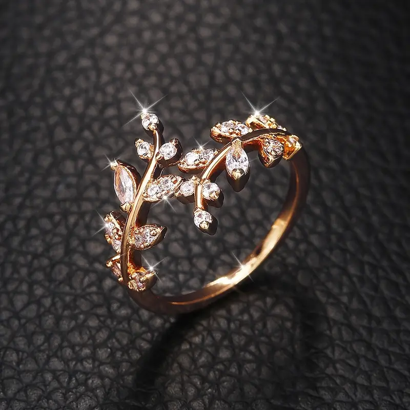 Bague en Zirconium avec Feuille Dorée