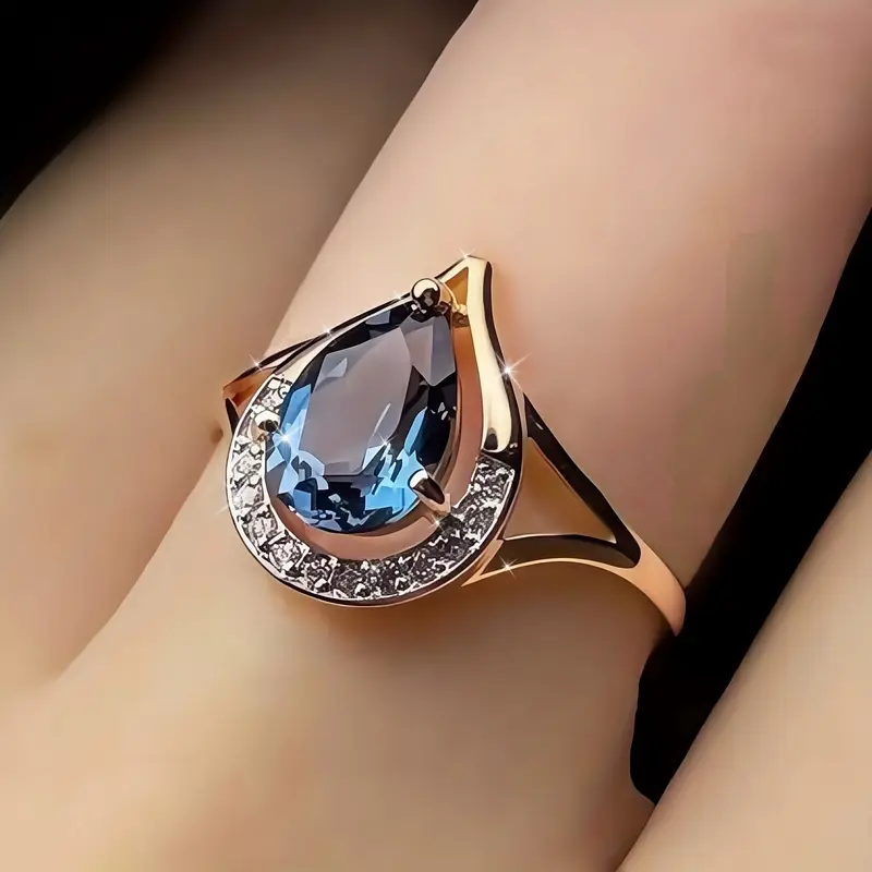 Bague Orbit avec Goutte de Cristal Bleu