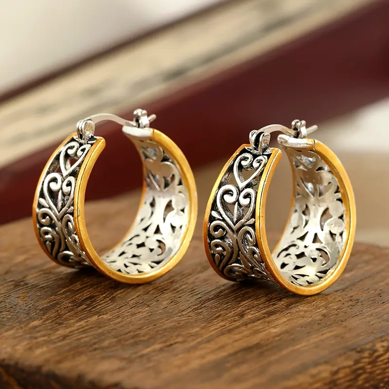 Boucles d'oreilles en or et en argent avec lierre creux